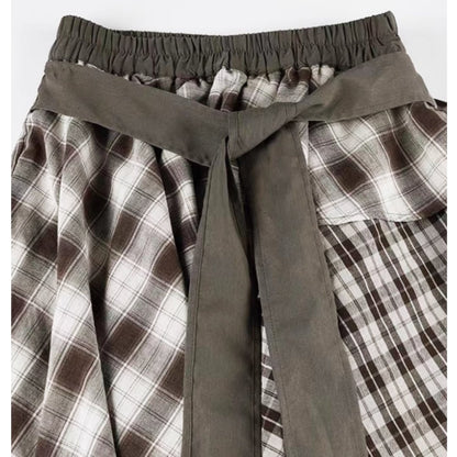 Irregular hem check skirt E7010