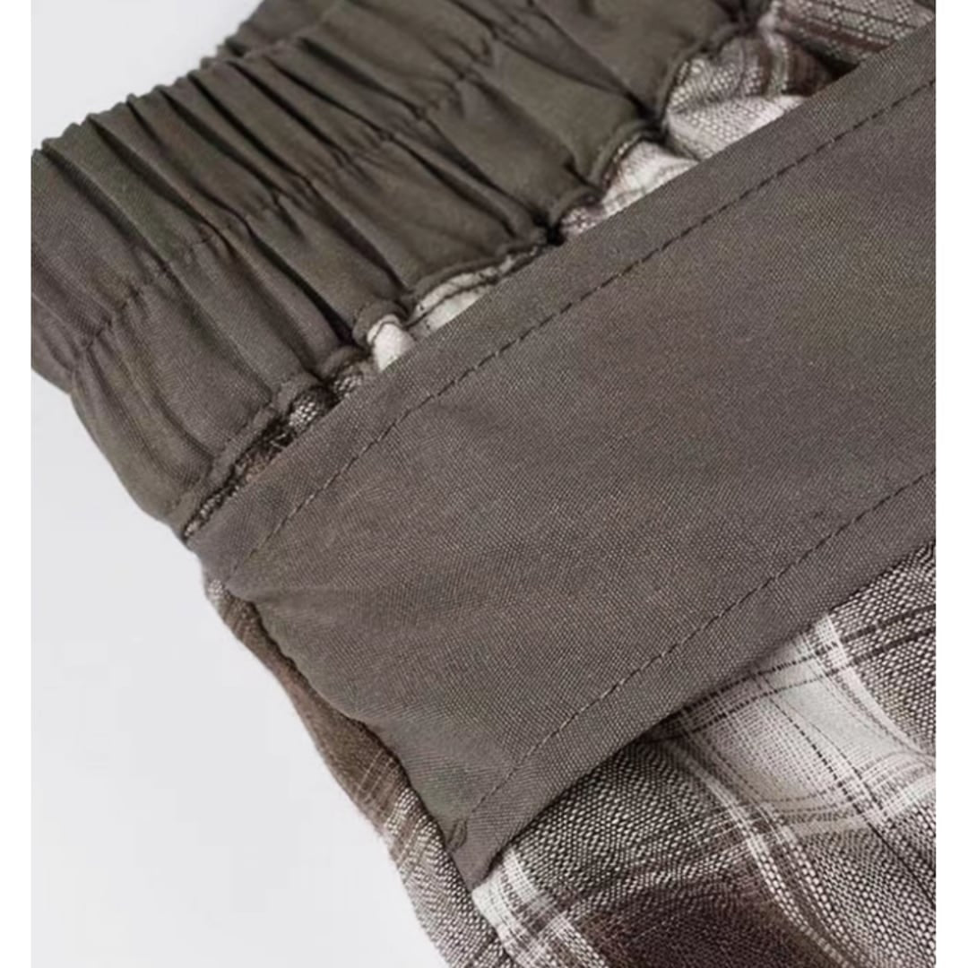 Irregular hem check skirt E7010