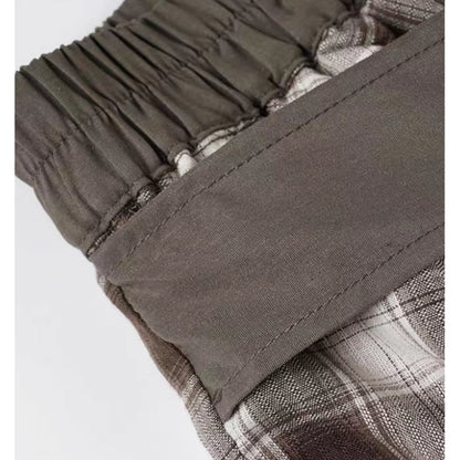 Irregular hem check skirt E7010